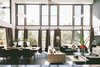 The living space, full of sunshine breezes and a great view with a double hight ceiling. The thermal mass floor catches the winter sun. Photo 4 of Eco 234 modern home