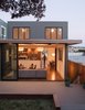 Modern home with Exterior, House, Wood Siding Material, and Flat RoofLine. rear of the house from the yard, a 16' wide sliding door opens up the living space Photo 3 of Glen Park House