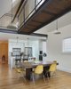 Modern home with Staircase, Metal Railing, and Wood Tread. new bridge and hangout space above Photo 4 of Bridge House