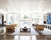 Modern home with Living Room, Ceiling Lighting, Concrete Floor, Sofa, Coffee Tables, and End Tables. living room with tall french doors Photo 4 of Wild Way Remodel