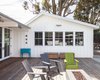Modern home with Exterior, Wood Siding Material, Gable RoofLine, Shingles Roof Material, House Building Type, and Farmhouse Building Type. bank of double-hung windows in old garage Photo 8 of Wild Way Remodel