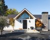 Modern home with Exterior, Gable RoofLine, House Building Type, Farmhouse Building Type, Concrete Siding Material, Stucco Siding Material, Wood Siding Material, and Metal Roof Material. modern farmhouse front door Photo of Sonoma Farmhouse