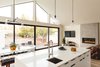 Modern home with Kitchen, Light Hardwood Floor, White Cabinet, Pendant Lighting, Undermount Sink, and Engineered Quartz Counter. great room Photo 5 of Sonoma Farmhouse