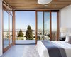 Modern home with Bedroom, Night Stands, Bed, Porcelain Tile Floor, Recessed Lighting, and Pendant Lighting. cedar wood ceiling quantum sliding doors porcelain tile flooring master bedroom Photo 4 of Bungalow Update