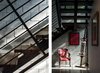 Modern home with Staircase, Wood Tread, and Metal Railing. The urban/industrial appeal of the home is immediately apparent upon entry. Block walls frame a two-story entry lobby with a steel and wood staircase that ascends to the main level. Photo 4 of 400SOLA
