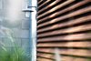 Modern home with Outdoor and Front Yard. Brazilian wood screens provide privacy and filtered light into the architect's studio within. Photo 6 of 400SOLA