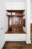 Modern home with Hallway, Medium Hardwood Floor, and Dark Hardwood Floor. Compact mudroom off the front entry offers storage and recessed drawers for mail and all the things you'll likely to lose (including your keys!) Photo 7 of Tennis House