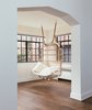 Modern home with Shed & Studio, Living Space Room Type, Family Room Room Type, Den Room Type, and Sun Room Room Type. Solarium off of the dining area with hanging swing chair Photo of Tennis House