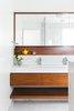 Modern home with Bath Room, Ceiling Lighting, Marble Floor, One Piece Toilet, Full Shower, Marble Counter, Recessed Lighting, Enclosed Shower, Marble Wall, and Undermount Sink. Masterbathroom with custom walnut vanity and medicine cabinet niche Photo 9 of Tennis House