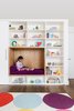 Modern home with Kids Room, Shelves, Bookcase, Playroom Room Type, Bench, Toddler Age, Storage, Dark Hardwood Floor, Neutral Gender, Bedroom Room Type, and Rug Floor. Child's bedroom with custom cabinetry and reading nook Photo 10 of Tennis House