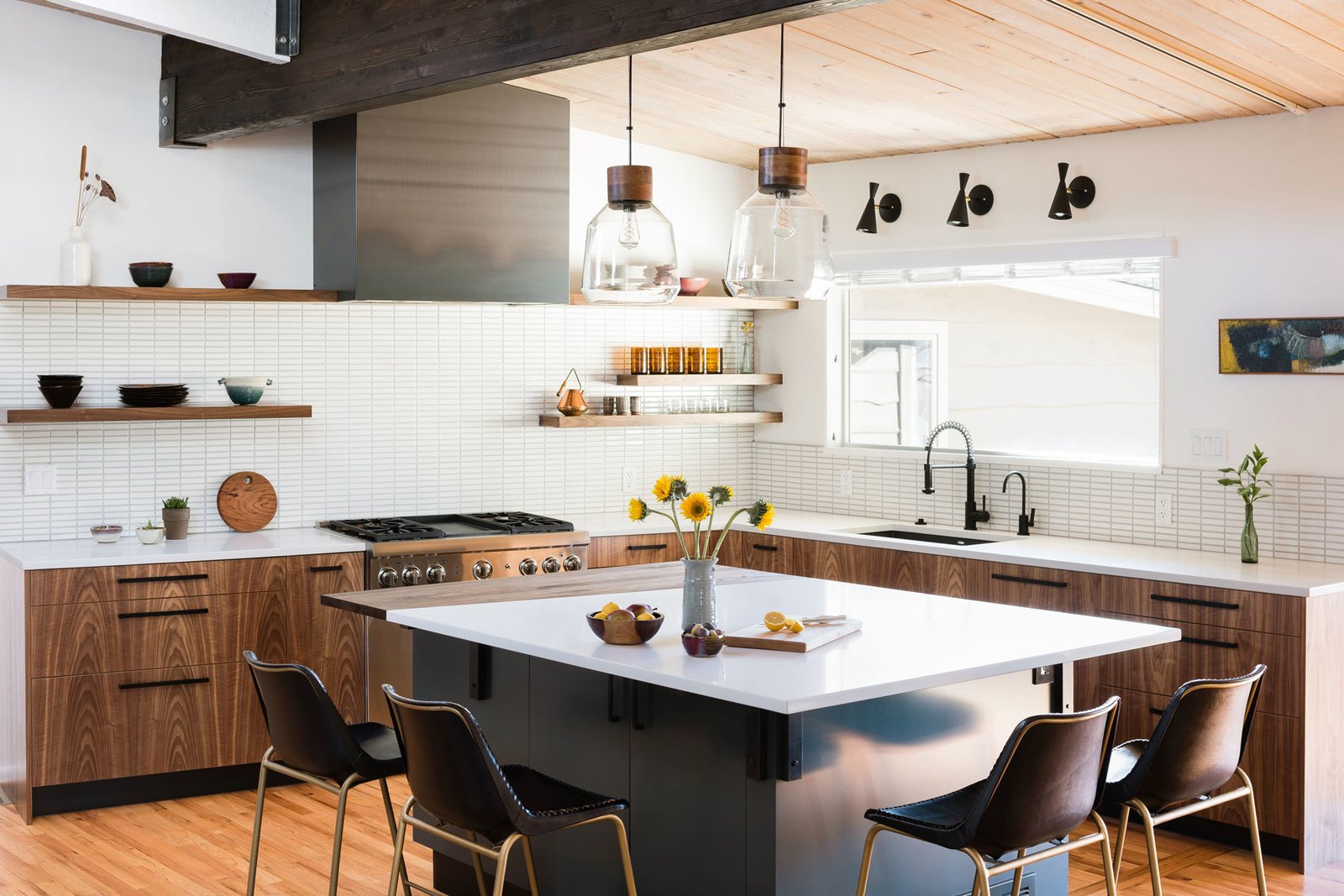 Our DIY paint grade flat panel doors and custom panels are installed in the island.
