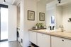 Modern home with Bath Room, Subway Tile Wall, Concrete Floor, Ceiling Lighting, Drop In Sink, Open Shower, Laminate Counter, and Track Lighting. Bathroom Photo 14 of The Golf Course House