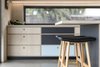 Modern home with Kitchen, Laminate Cabinet, Brick Backsplashe, Laminate Counter, and Concrete Floor. Kitchen bench Photo 6 of The Golf Course House