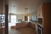 A modern kitchen that opens up into the living area Photo 4 of Round House in Wine Country modern home