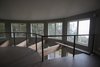 The open-to-below feature allows them to enjoy the view from anywhere in the home Photo 5 of Round House in Wine Country modern home