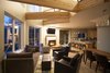The open floorplan makes the living area spacious and inviting Photo 9 of Round House in Wine Country modern home