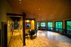 Modern home with Recessed Lighting, Light Hardwood Floor, Windows, and Casement Window Type. This home takes advantage of the panoramic views with expansive windows Photo 2 of A Deltec Tree House