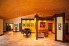Modern home with Living Room, Recessed Lighting, Ceiling Lighting, and Light Hardwood Floor. The seating area & ballroom Photo 3 of A Deltec Tree House