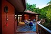 Modern home with Outdoor, Back Yard, Wood Patio, Porch, Deck, Trees, Large Patio, Porch, Deck, and Decking Patio, Porch, Deck. Wrap around deck allows him to even further embrace his mountainous surroundings Photo 4 of A Deltec Tree House