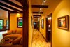 Modern home with Hallway, Light Hardwood Floor, and Medium Hardwood Floor. Long, dramatic hallway Photo 7 of A Deltec Tree House