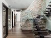 Modern home with Staircase, Wood Tread, and Metal Railing. Staircase Photo 4 of Modern Cabin in Ste-Adele