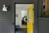 Modern home with Hallway and Ceramic Tile Floor. The Downstairs at The Bracy House Photo 6 of The Bracy House