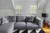 Modern home with Living Room, Sofa, End Tables, and Table Lighting. The Upstairs at The Bracy House Photo 7 of The Bracy House