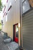 Modern home with Exterior, Wood Siding Material, Vinyl Siding Material, and House Building Type. Side entrance to basement dwelling Photo 4 of Contemporary Home With Chef's Kitchen