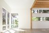 Modern home with Living Room, Ceiling Lighting, and Light Hardwood Floor. Living room with corner windows Photo 8 of Contemporary Home With Chef's Kitchen