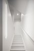 Modern home with Staircase, Wood Tread, Metal Railing, and Wood Railing. Stair to third floor family room Photo 13 of House Grace