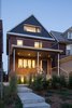 Modern home with Exterior, House Building Type, Shingles Roof Material, Wood Siding Material, and Brick Siding Material. Street facade with with subtle updates and highlights Photo 2 of House Grace