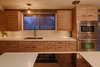 IKEA frameless cabinets fit nicely into the house’s minimal design. Photo 11 of Cliff May Homes RM 3212 modern home