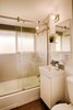 The house’s main bathroom, renovated with new fixtures and finishes. Photo 17 of Cliff May Homes RM 3212 modern home