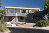 A rotated second floor plan, cladded with a beetle kill pine rainscreen, is design to optimize southern exposure while capturing flatiron views. Photo 12 of Sunset modern home