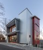The overall goal was to keep the design footprint small, and the views grand. Covered with a metal panel system, it’s a rustic yet high tech cabin nestled in the woods for the 21st century. Photo 12 of Love Shack modern home