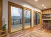 Lift & Slide Door - Zola Thermo Clad
The modern cabin uses Zola European Windows and doors throughout the space. They chose the ultra energy-efficient Zola Thermo clad Windows, featuring tilt-turn windows and Lift & Slide Doors that open up on dual sides to a large balcony porch. The Zola Lift & Slide Doors open up into the great room, allowing for spectacular views of Lake Fontana and the iconic Blue Ridge and Smokey Mountains beyond.
Zola Lift & Slide Door is an innovative solution for maximizing views using wide uninterrupted expanses of glass. These doors offer exceptionally high energy performance and superior operability. Available in the PanoramicView, Thermo Alu lines, Thermo Plus Clad, Thermo Clad, Thermo Wood and Thermo uPVC product lines. Photo of Love Shack modern home