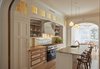 Kitchen designed by architect Louis Mackall. Cabinet fabrication by James Schriber Furniture. Tile backsplash by Mosaic House in NY, specializing in Moroccan Tiles.
Architect Louis Mackall designed two archways, with custom arched pocket doors from Breakfast Woodworks for the parlor opening. Photo 9 of Carroll Gardens Passive House modern home