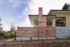 True to the prairie style, the form was kept low and friendly with hipped roofs and broad overhanging eaves. Photo 4 of Prairie Passive modern home