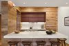 The custom open kitchen pairs strips of reclaimed wood and marble sourced locally from Vermont Danby Marble. Photo 20 of An Historic TriBeCa Building Reborn modern home