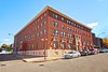 The old brick and terracotta building was important historically for McKeesport. Photo 3 of McKeesport Downtown Housing modern home