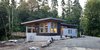 Modern home with Windows, Wood, and Casement Window Type. Shou Sugi Ban (charred wood) siding creates a resilient and beautifully, natural feel. Zinc-alum metal siding provides a hard contrast to the organic nature of the rest of the exterior. Photo 2 of Cedar Haus