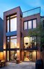 Modern home with Doors, Interior, Sliding Door Type, Wood, Metal, and Exterior. This rear opening included the addition of several expansive, triple-panel Lift & Slide doors that span the width of the rooms. Photo 2 of First Passive House Plus in the U.S.