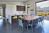Modern home with Doors, Exterior, Interior, Sliding Door Type, Wood, and Metal. Interior designer Jacque Jenkins-Stireman filled the interior space with furniture, fixtures, and accents including the SONNEMAN Lighting Stix LED pendant above the dining table. Cabinets are by Brian Stepek Custom Carpentry. Photo 3 of House of Fir