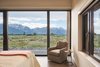 A Lift & Slide Door from Zola Windows opens directly from the master bedroom onto the sage brush landscape that surrounds the home. Photo 8 of House of Fir modern home