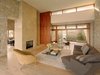 Modern home with Living Room, Chair, Sofa, Standard Layout Fireplace, Gas Burning Fireplace, and Light Hardwood Floor. Edgewood House
Mill Valley, CA Photo 5 of Edgewood House