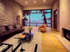 Modern home with Living Room, Light Hardwood Floor, Sofa, Coffee Tables, Standard Layout Fireplace, Chair, and Gas Burning Fireplace. Edgewood House
Mill Valley, CA Photo 4 of Edgewood House