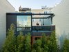 View of the Sun Room and Roof Deck from the neighboring rooftop. Photo 17 of Telegraph Hill Periscope modern home