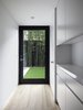 View of the rear yard and bamboo hedge beyond from the Entry Foyer. Photo 13 of Telegraph Hill Periscope modern home