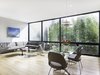 View of the Living-Dining Room with expanse of windows and bamboo hedge beyond for privacy. Photo 8 of Telegraph Hill Periscope modern home