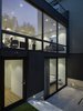 Rear Yard view of the addition and remodel showing the large expanse of windows at the Living-Dining Room Level and the Sunken Courtyard at the Master Bedroom. Photo 4 of Telegraph Hill Periscope modern home